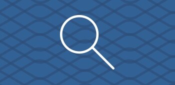 An icon of a magnifying glass.
