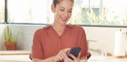 A woman using a smartphone.
