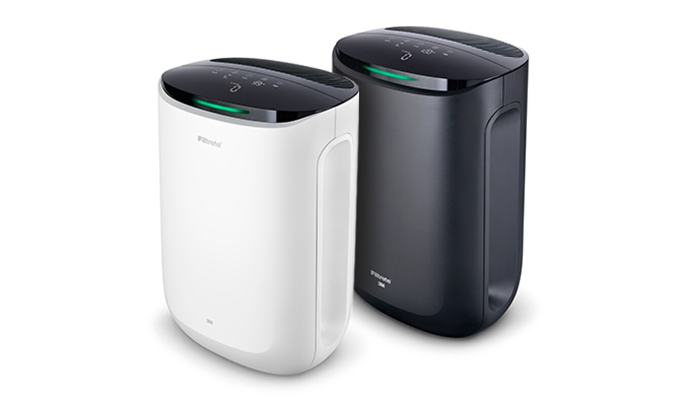 Black and white small room Filtrete™ Smart Air Purifiers side by side.
