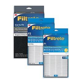 Three different Filtrete™ Brand room air filters stacked diagonally.